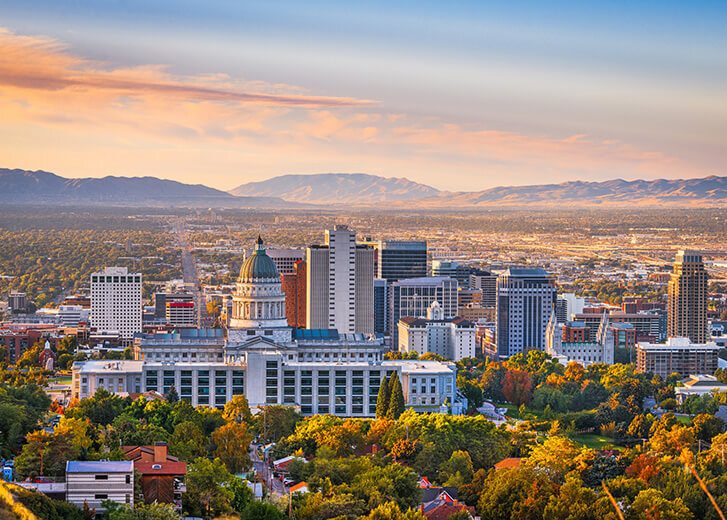 Salt Lake City, Utah, USA downtown city skyline at dawn.